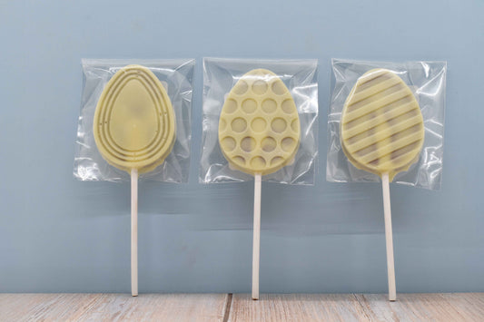 Sucette oeuf praliné blanc